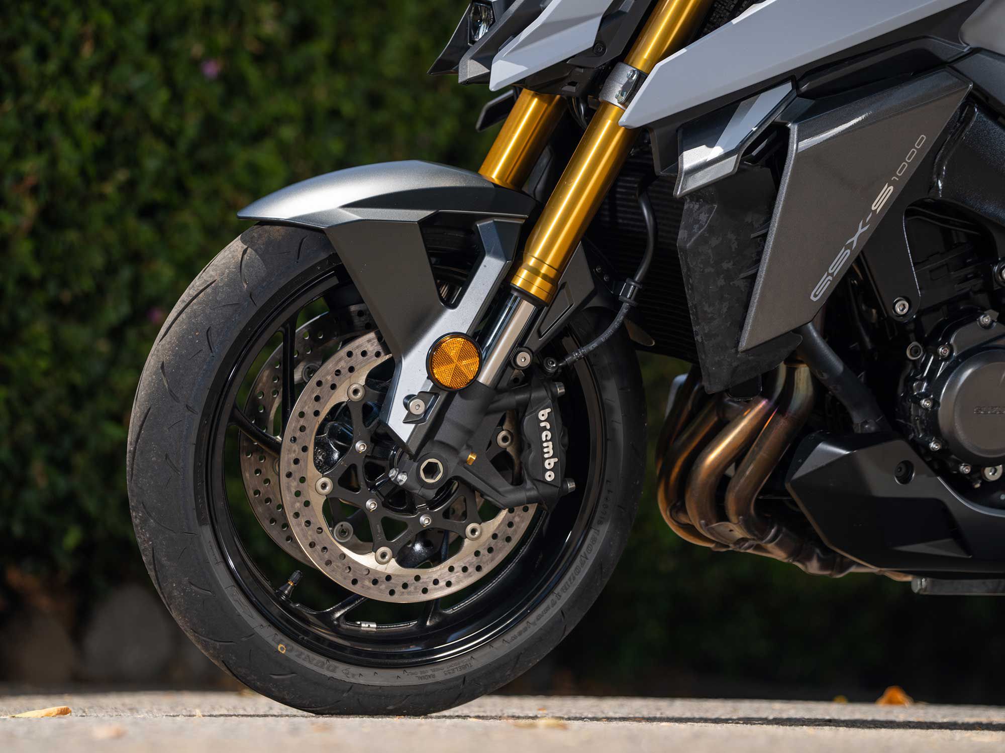 The Suzuki rolls on a stout set of hydraulic disc brakes that do a fine job of slowing down the 472-pound GSX-S1000.