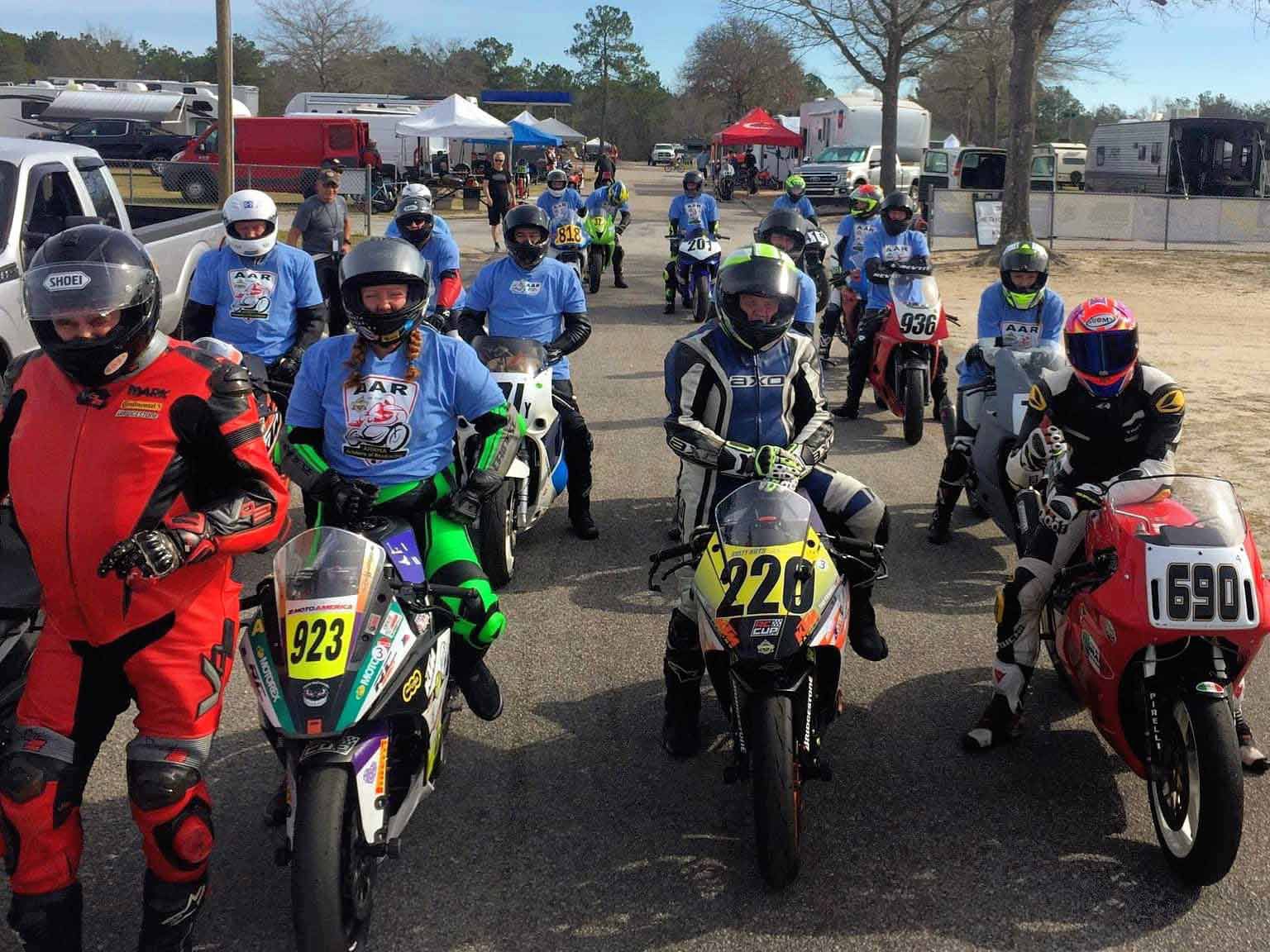 Mark Morrow (left) leads aspiring racers at this year’s race weekend at Carolina Motorsports Park.