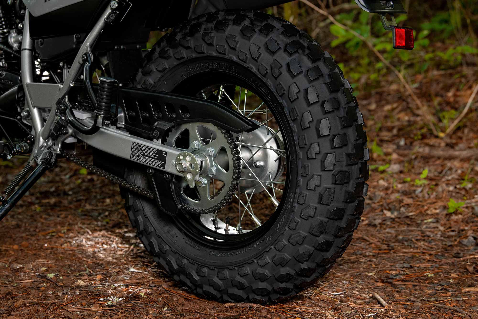 The tire tread of the rear wheel nearly meets the spoked rim. Bring on the rocky roads.