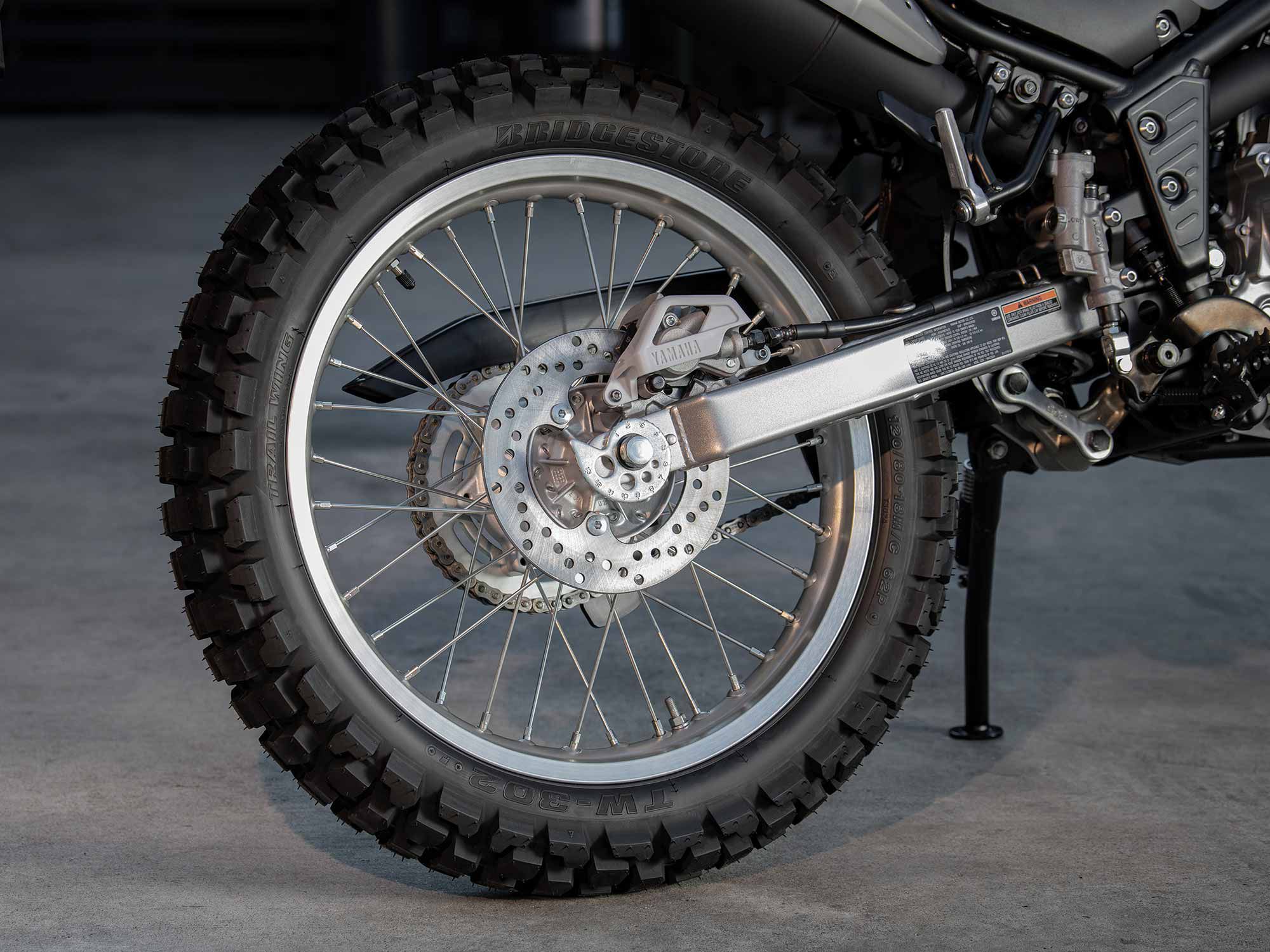 Spoked rims, knobby tires, and long suspension travel, the makings of a trail-ready machine.