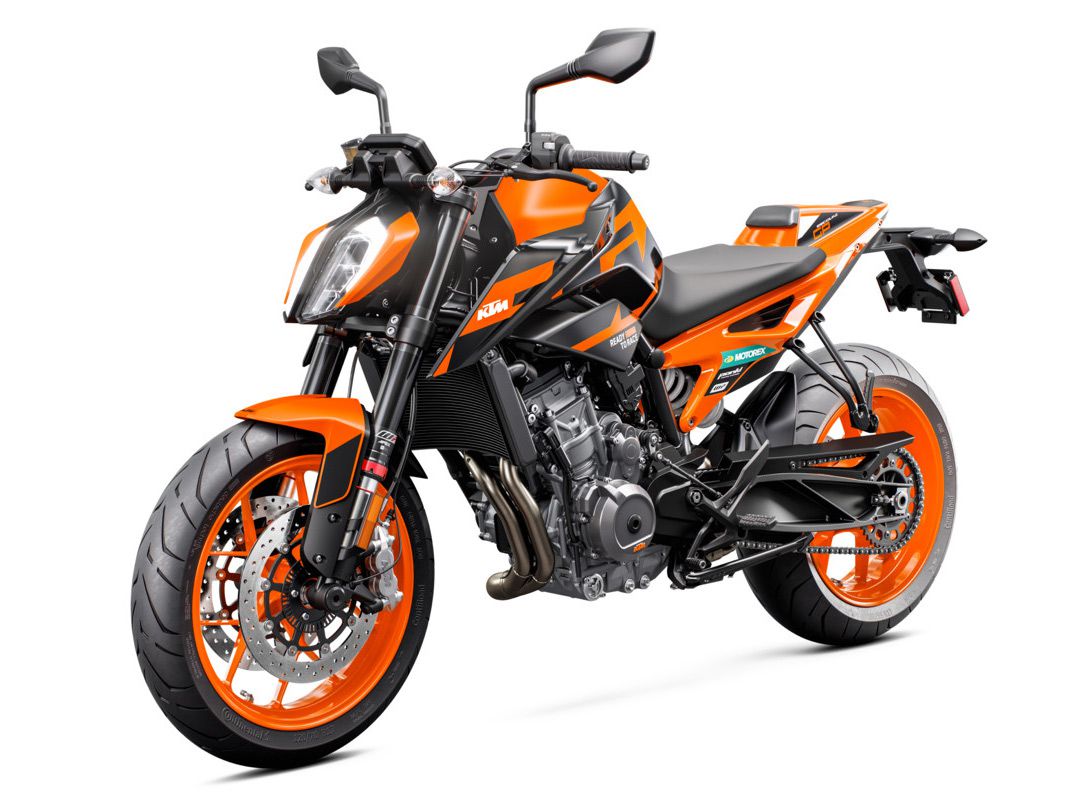 The 890 Duke GP slots in between the base model and R, by using KTM’s more mellow engine map, but adding GP-inspired paint, orange wheels, and a passenger seat cover.