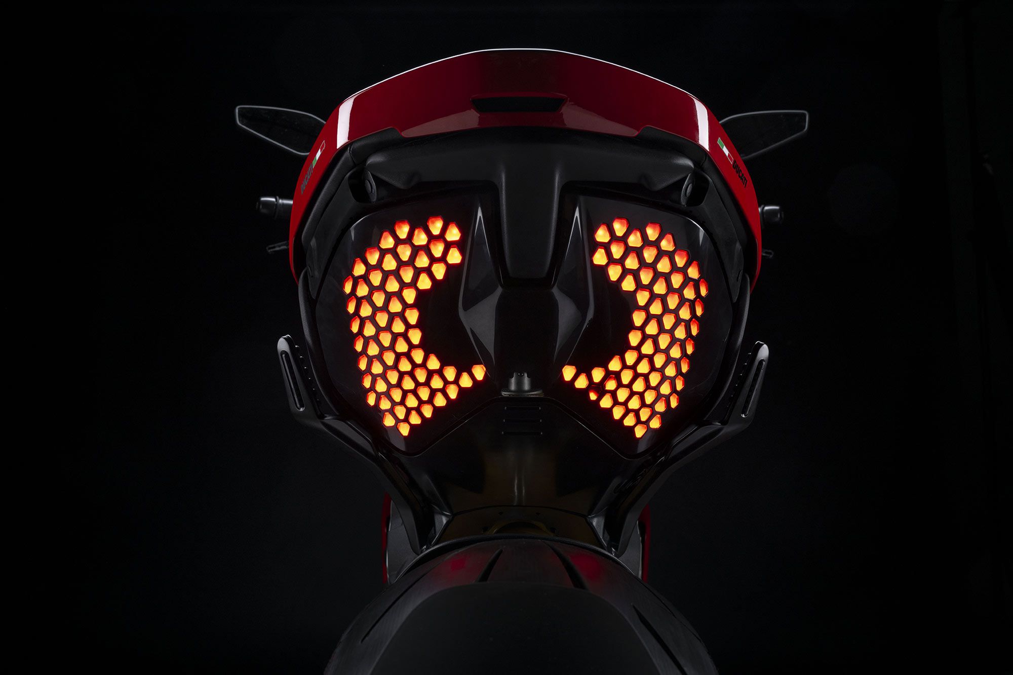 Ducati isn’t afraid to push the limits when it comes to styling, especially on the Diavel. Taillights are made of dozens of tiny LEDs shining through honeycomb-style holes under the tail.