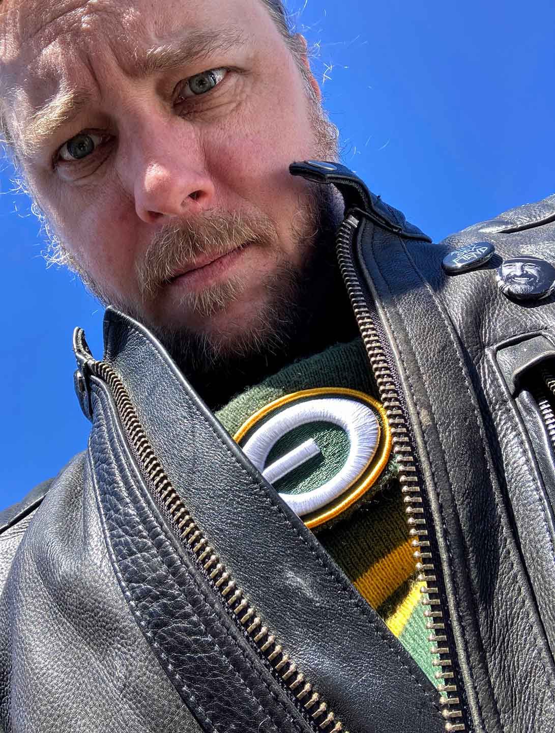 The spring chill in Texas is no match for a Green Bay Packer hat under the leathers.