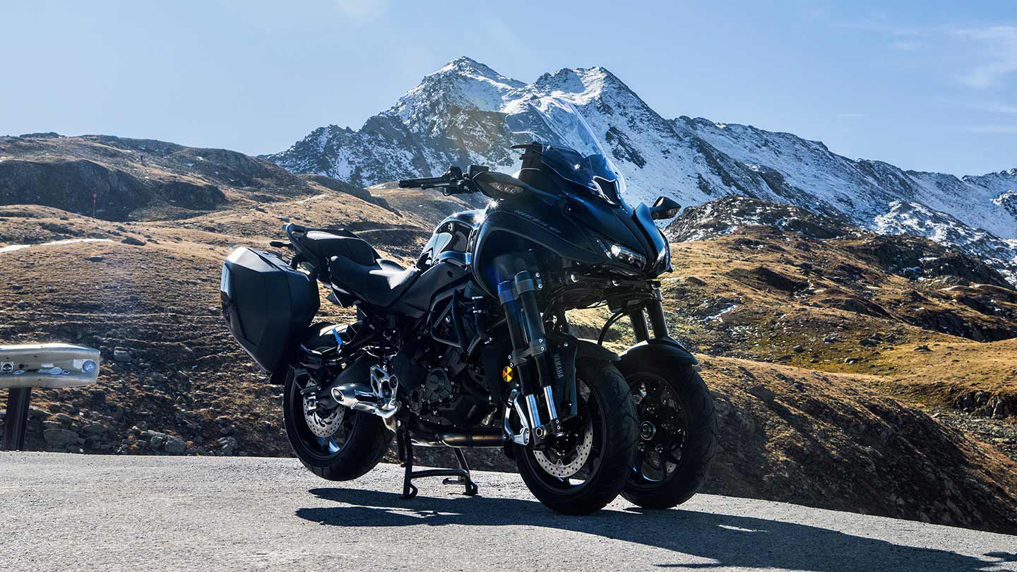 The large (fixed and hard) 30-liter side panniers are big enough to take a full-size helmet.