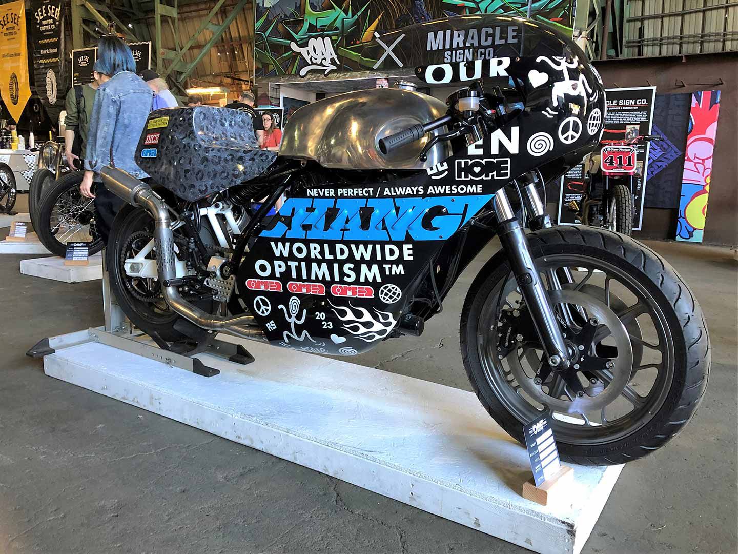This one-time 2022 Indian Chief Dark Horse became a cafe custom via a collaboration between <i>DicE</i> magazine and Indian. Called R/T Four Thirteen, the bike features work by Noise Cycles, Hindes Design, and Ornamental Conifer, with the rear end converted from a twin shock to Öhlins monoshock arrangement. It won the American-Made Award.