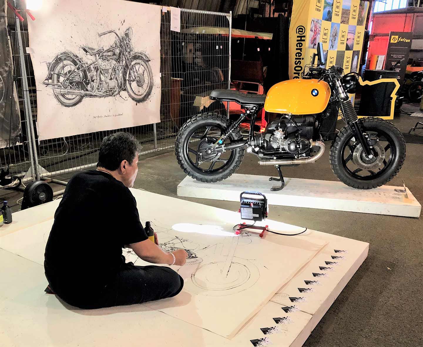 A show regular, Makato Endo was spotted doing his trademark painting with India ink and chopsticks at the back area. This year’s subject was a 1995 BMW R100.