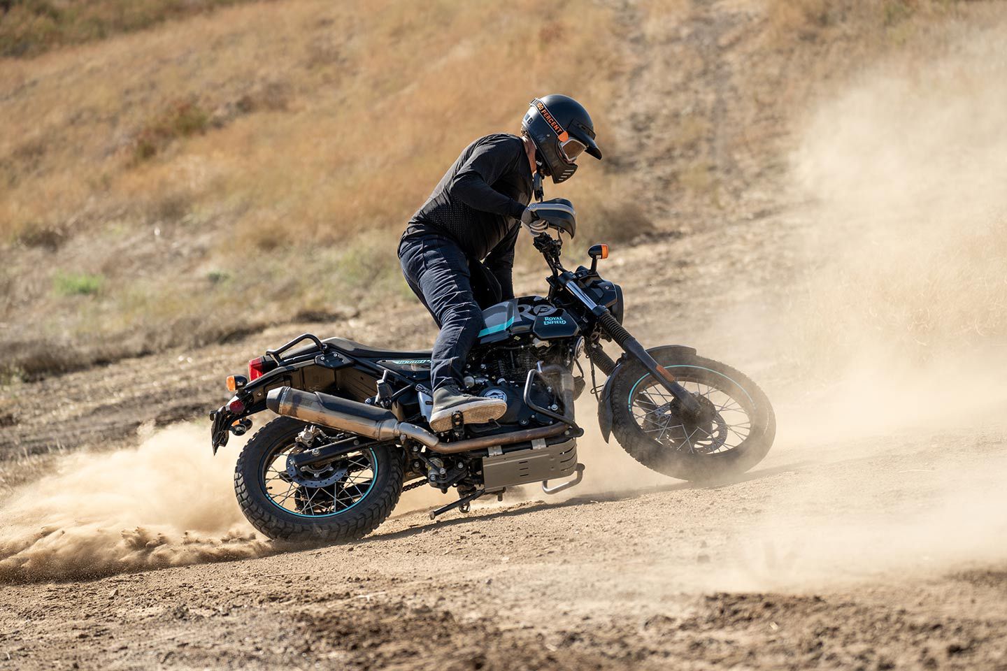 Throwing roost aboard Royal Enfield’s Scram 411.