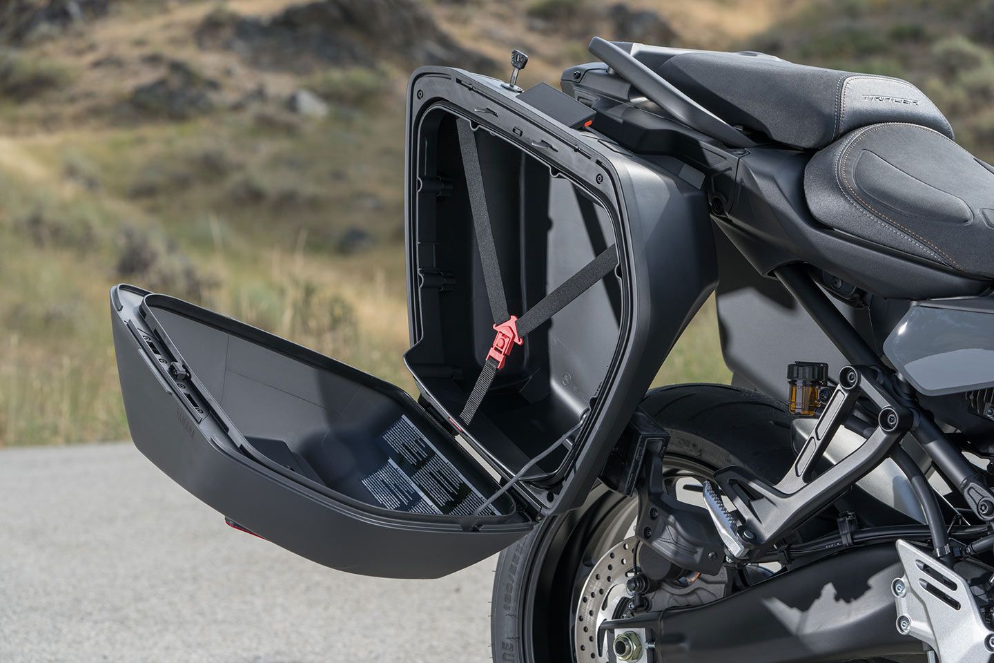 The 2024 Yamaha Tracer 9 GT+ can swallow nearly 8 gallons of cargo (and a full-face helmet) inside each hard case bag. The luggage is lockable and easy to remove.